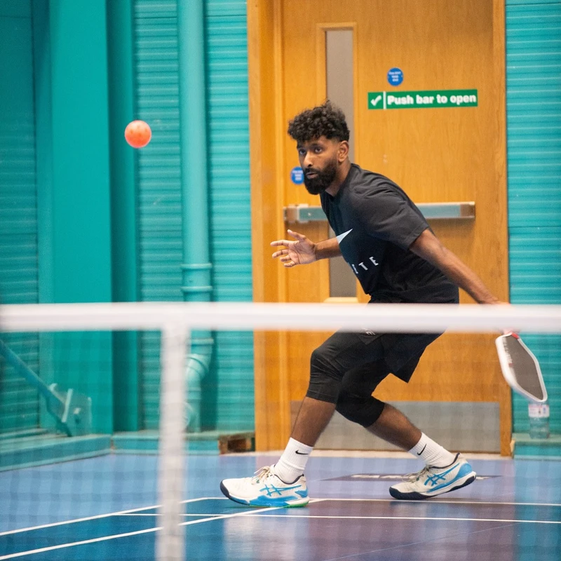 Muhammad playing competitive pickleball